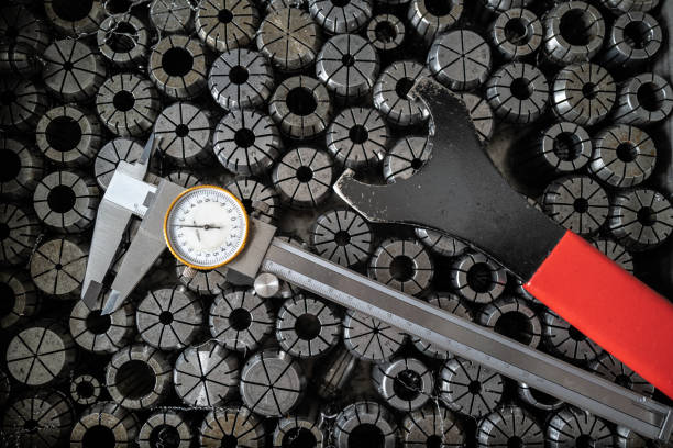 Image showing a close-up of a Vernier caliper being cleaned with a cloth, highlighting the importance of proper maintenance for accurate measurements"